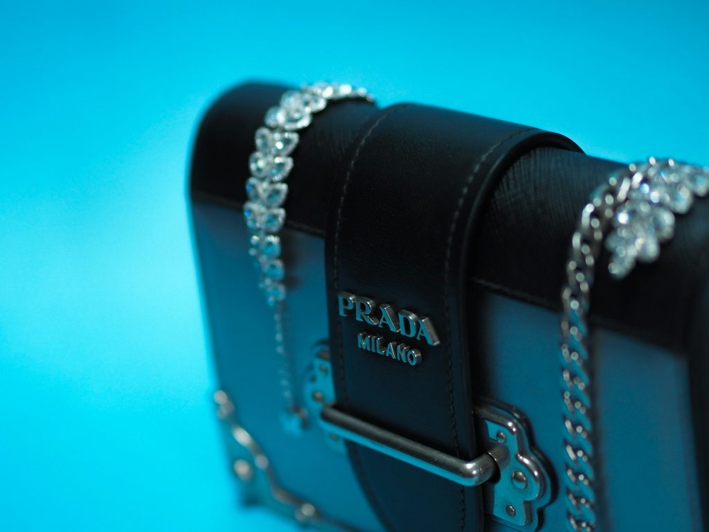 black leather belt with silver buckle